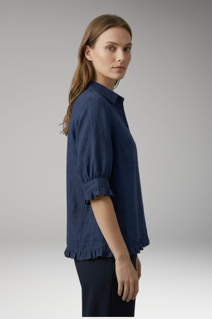 Women's Blouse with Button Closure and Ruffled Hem