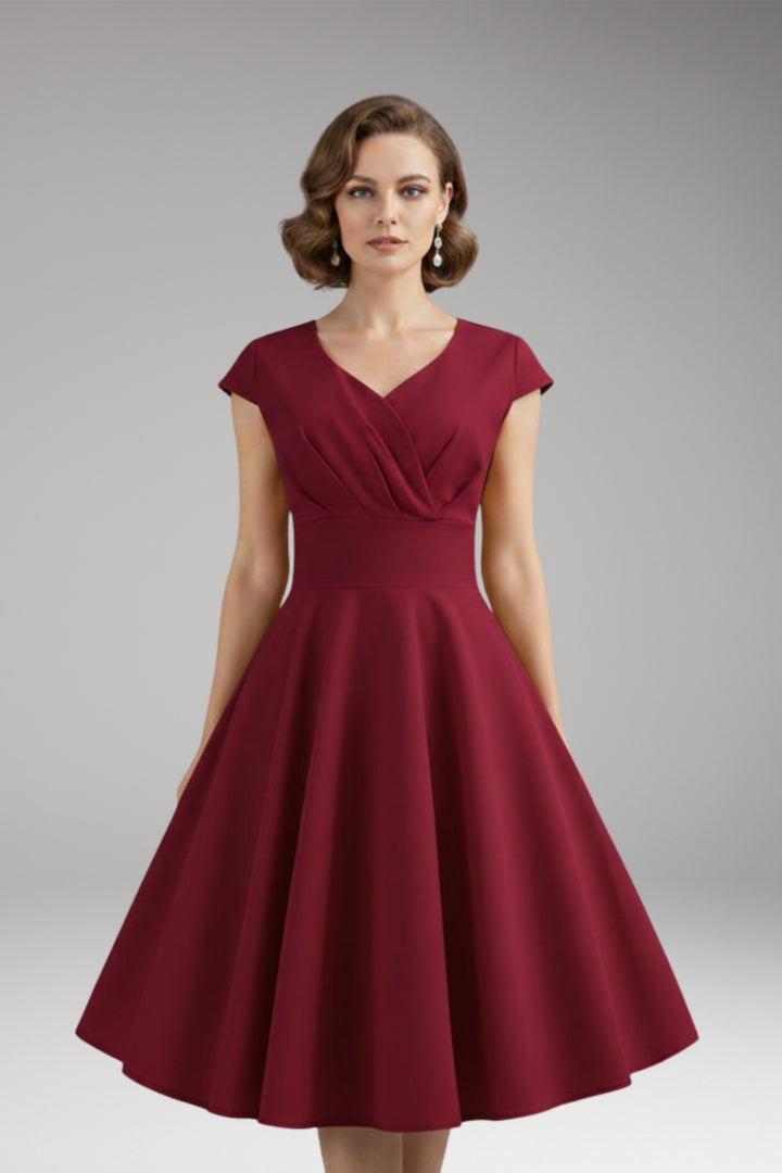 Women's Dress with Waist Cut and Flowing Hem